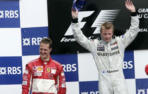 F1 Montreal: Kimi Rikknen, West McLaren Mercedes, Sieger; Michael Schumacher, Ferrari, Zweiter